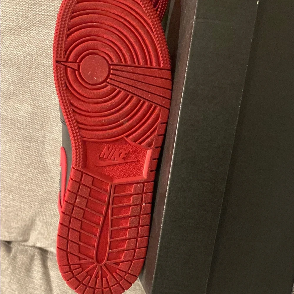 Nike Air Jordan 1 Mid Red and Black High-Top Sneakers